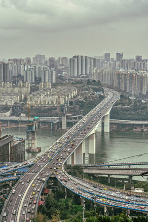 Chongqing, China - Dec 20, 2019: Flyover bridge with traffic in a rainy dayのeditorial素材