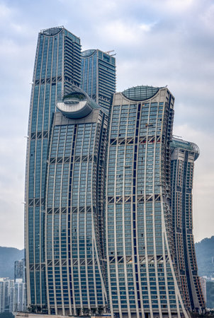 Chongqing, China - Dec 22, 2019: Ascott Raffles City hotel buidling with crystal skybridge on top in...