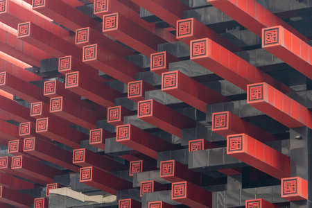 Chongqing, China - Dec 22, 2019: Guotai Artistic Center exterior with traditional Chinese seal decorationのeditorial素材