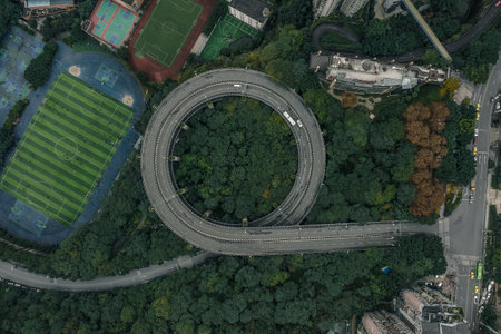 Aerial overhead shot of particular double circle 720 degree flyover in bushes residential buildings...