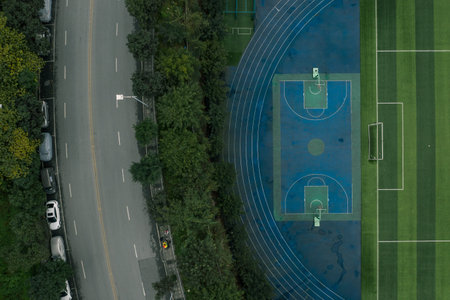 Aerial overhead shot of school football basketball field in Chongqing, southwest China municipal...