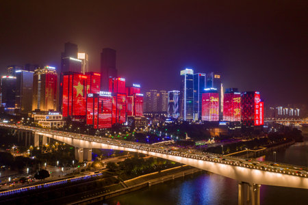 Aerial view of Huang Hua Yuan bridge over Jialing river in the night with lighted buildingのeditorial素材