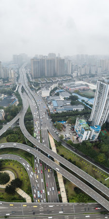 Aerial pano drone shot of populated residence buildings alng Yangtze river in Chongqing, southwest...