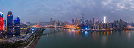 Aerial Pano drone shot of Hong Ya Dong cave by Jialing river with Qiansimen suspension bridgeのeditorial素材