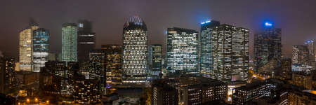 Aerial drone night shot of office in Tour Thales DXC Technology in La defense Financal district in heavy fogのeditorial素材