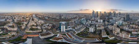 360 aerial drone photo of Levallois and La Defense skyscrapers by la Seine during sunset hourのeditorial素材