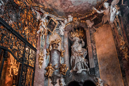 St Jerome Hieronymus statue with two angels on top in entrance hall to Baroque church Asamkircheのeditorial素材