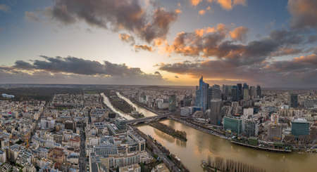 Dec 24, 2019 - Paris, France:Aerial drone shot of Neuilly la defense skyscraper complex during sunset time in Parisのeditorial素材