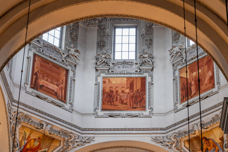Paintings with murals under window of the dome inside Salzburg Cathedral
