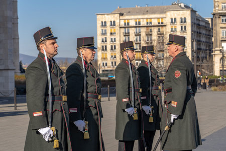 Change of guards in uniform with swords in front of Hungarian Parliament in Budapest