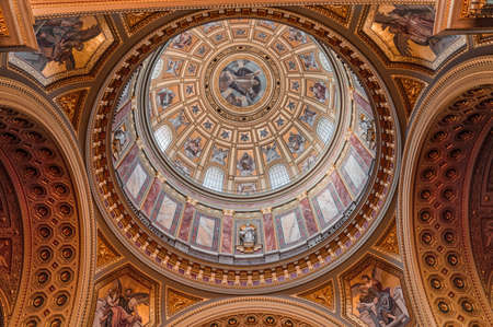 Upward view of gilded golden dome cupola inside St. Stephen's Basilicaのeditorial素材