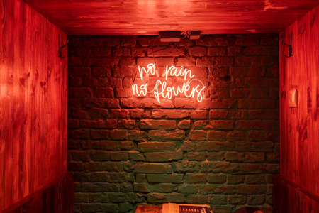 Budapest, Hungary - Feb 10, 2020: Neon light decoration on the wall of Neverland bar in Pestのeditorial素材
