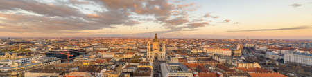 Panorama aerial drone shot of St. Stephen Basilica during Budapest sunset hour in winter timeの写真素材
