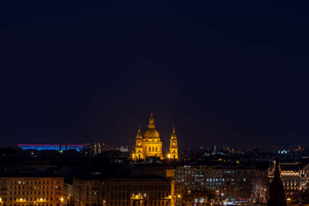 Danube river with lights on and full moon in Budapest winter. High quality photoの写真素材