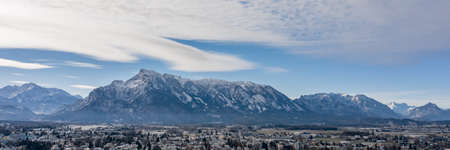 Aerial drone view of Salzburg snowy Unesberg mountain in winter morning timeの写真素材