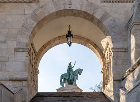 Bronze statue of Equestrian statue of King St. Stephen at Fisherman Bastion in morning sunlight in winterの写真素材