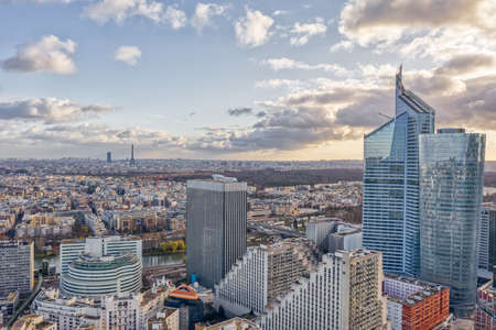 Aerial drone shot of Levallois Neuilly Paris with Eiffel Tower tour montparnasse, jardin dacclimation from La Defenseの写真素材