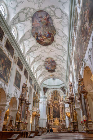 Nave view over pews of altar and ceiling of St Peter abbey churchのeditorial素材