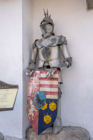 Ancient hungarian suit of armour and helmet shield with coat of arms in winter timeのeditorial素材