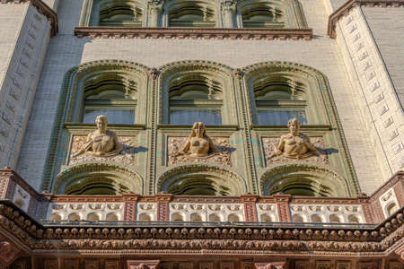 Budapest, Hungary - Feb 9, 2020: Majolica statues of Brudern house Parisi Udvar Hotel in sunsetのeditorial素材
