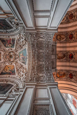 Feb 4, 2020 - Salzburg, Austria: Upward view of marble arch between nave and aisle with exquisite ornamentation inside Salzburg Cathedralのeditorial素材