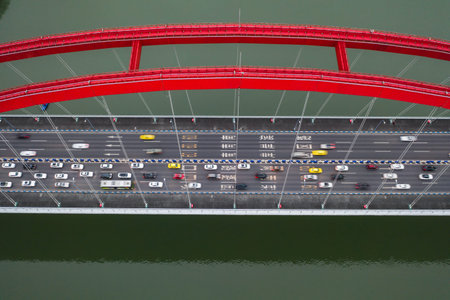 Aerial drone shot of Caiyuanba Changjiang bridge on Yangtze River in Chongqing, southwest China