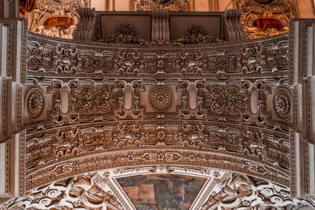 Feb 4, 2020 - Salzburg, Austria: Upward view of marble arch between nave and aisle with exquisite ornamentation inside Salzburg Cathedralのeditorial素材