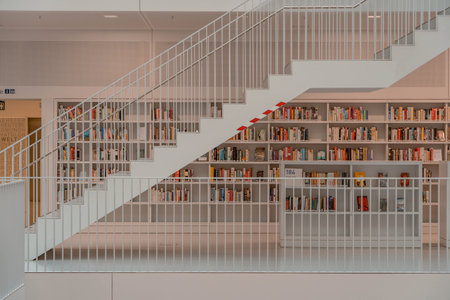 Stuttgart, Germany - Aug 1, 2020 - Stairs of Stadtbibliothek public library with sun light in the morningのeditorial素材