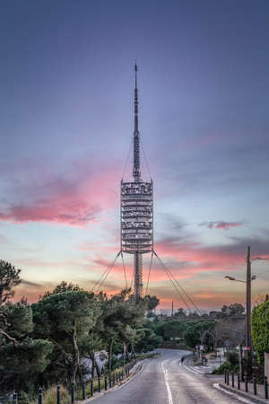 Radio telecom tower on top of Mount Tibidabo in Barcelona before sunset hourの写真素材