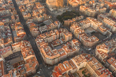 Aerial drone shot of Barcelona city before sunrise golden hourの写真素材