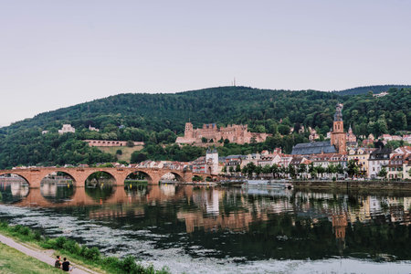 Heidelberg, Germany - Aug 1, 2020: Old town along Neckar river after sunsetのeditorial素材