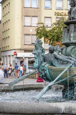 Koblenz, Germany - Aug 1, 2020: Fronze fontaine in town central parkのeditorial素材
