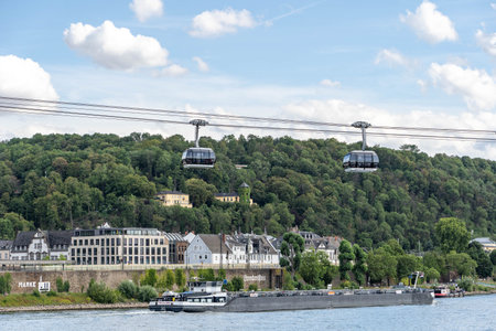 Koblenz, Germany - Aug 1, 2020: Masked tourists in cable car in summer