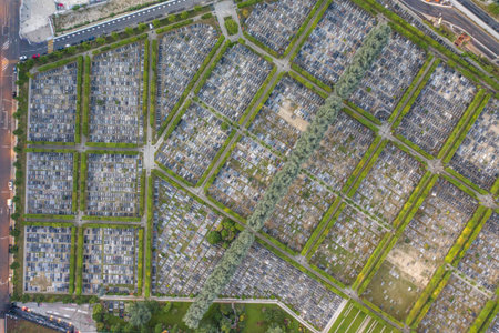Paris, France - Jun 18, 2020: Aerial overhead shot of La Defense Cemetry at dusk