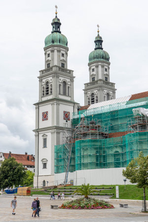 Kempten, Germany - Aug 3, 2020: Exterior of St Lorenz minor Basilica in renovation in cloudy daysのeditorial素材