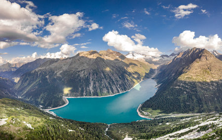 Aerial drone shot of Schlegeisspeicher glacier reservoir in zillertal alps in Austriaの写真素材
