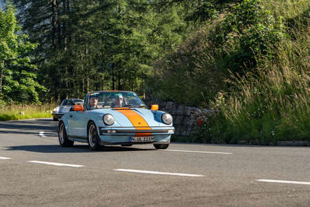 Grossglockner, Austria - Aug 8, 2020: Vintage Porsche car on high alpine road in summer morningのeditorial素材
