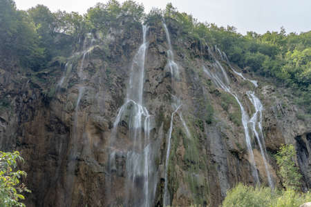 Big fall waterfall inside Plitvice Lake in Croatiaの写真素材