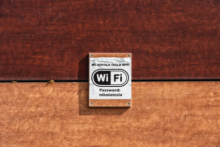 Smiljan, Croatia - Aug 12, 2020: WIFI logo on wall of Nikola Tesla memorial center