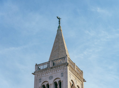 Zadar, Croatia - Aug 13, 2020: Rooftop of bell tower St. Donatus Church in early morning sunlight