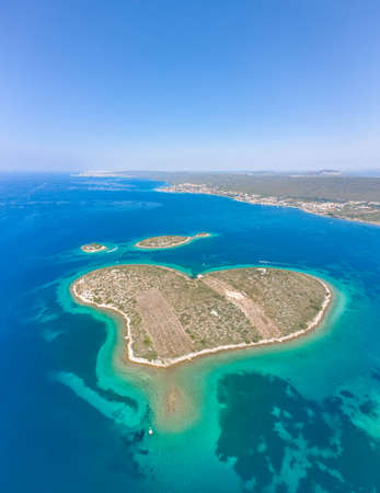 Aerial drone shot of heart-shaped island Galesnjak in Dalamatia Croatiaの写真素材