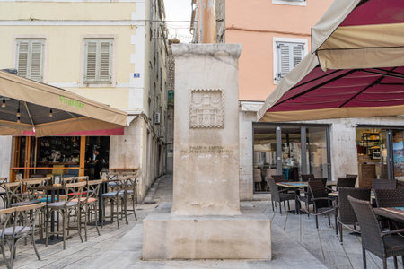 Split, Croatia - Aug 14, 2020: Coat of arm stone written in latin Happy is the palace of Split so long Salona is quietのeditorial素材