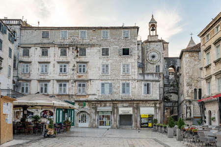 Split, Croatia - Aug 15 2020: Old stone facade at empty Peoples square Pjaca in the morningのeditorial素材