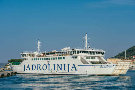 Split, Croatia - Aug 15, 2020: Liner ferry leave old town port in early morningのeditorial素材