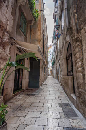 Split, Croatia - Aug 15, 2020: Ancient street passage view of old Diacletian Palace in old townのeditorial素材