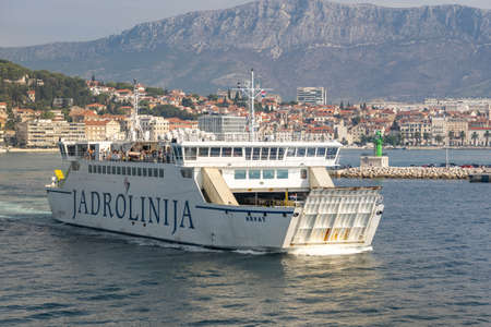 Split, Croatia - Aug 15, 2020: Liner ferry leave old town port in early morningのeditorial素材