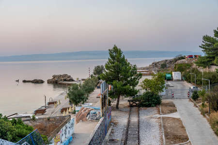 Split, Croatia - Aug 15, 2020: end of train rail near coastline in Split new town in summerのeditorial素材