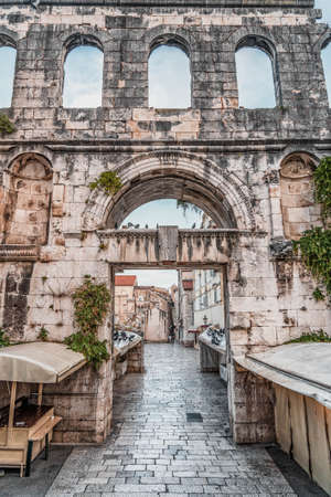 Split, Croatia - Aug 14, 2020: Ancient silver gate entrance to Diocletian Palace in early morningのeditorial素材