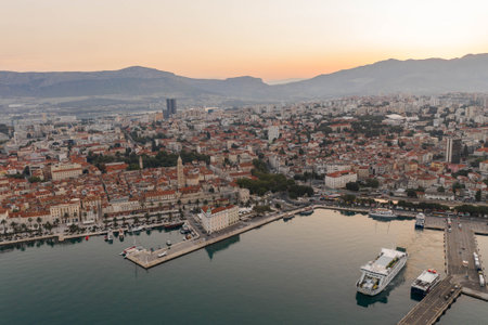 Split, Croatia - Aug 14, 2020: Aerial drone shot of Diocletian Palace by port riva in old town before sunrise in morningのeditorial素材