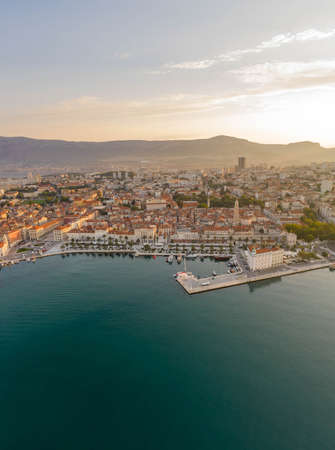 Aeril drone shot of Diocletian in rising sun light morning in Split old town Croatiaの写真素材